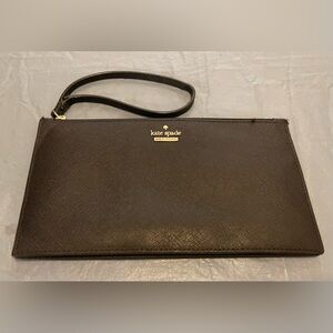 Kate Spade black Saffiano leather zip pouch in black with gold accents.